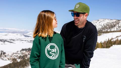 Father and daughter on June Mountain wearing June Mountain apparel.