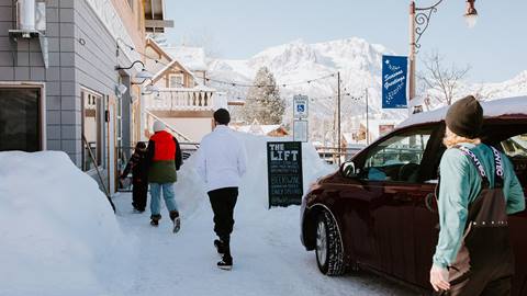 friends walking through town