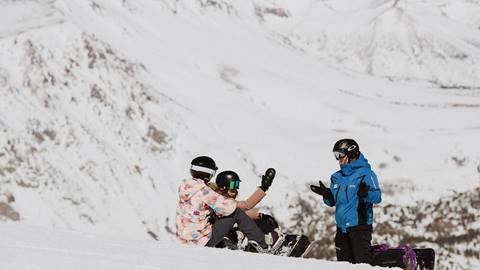 kids high fiving the instructor during a lesson